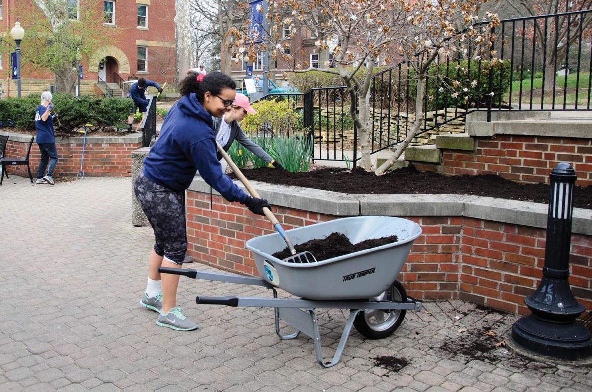 Dozens of students and employees gathered on The Christy Mall this spring to do landscaping and other work as part of Green Up Day.