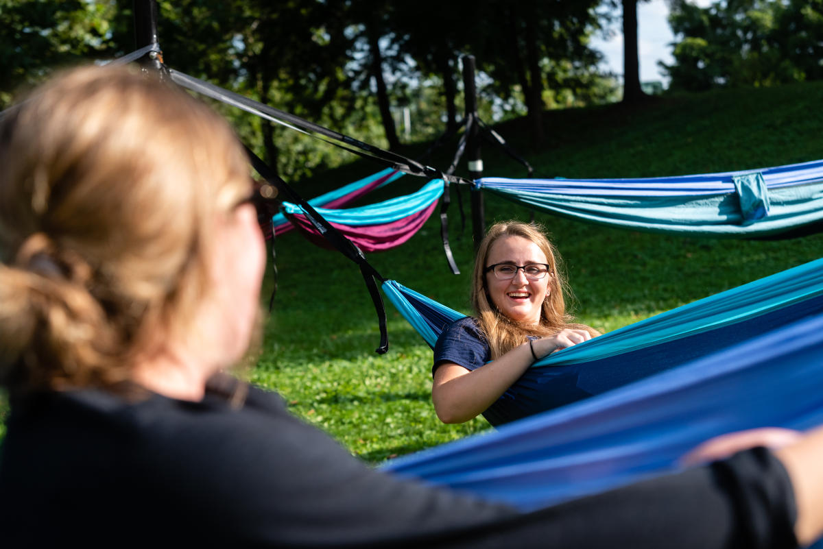 Ashley Klopfenstein of Marietta College lays in one of the new hammocks on campus