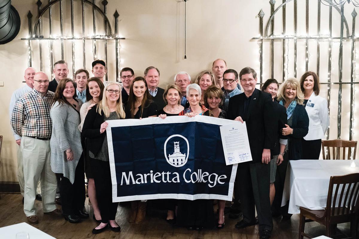 Philadelphia-area alumni show their Marietta pride at the Bourbon Blue