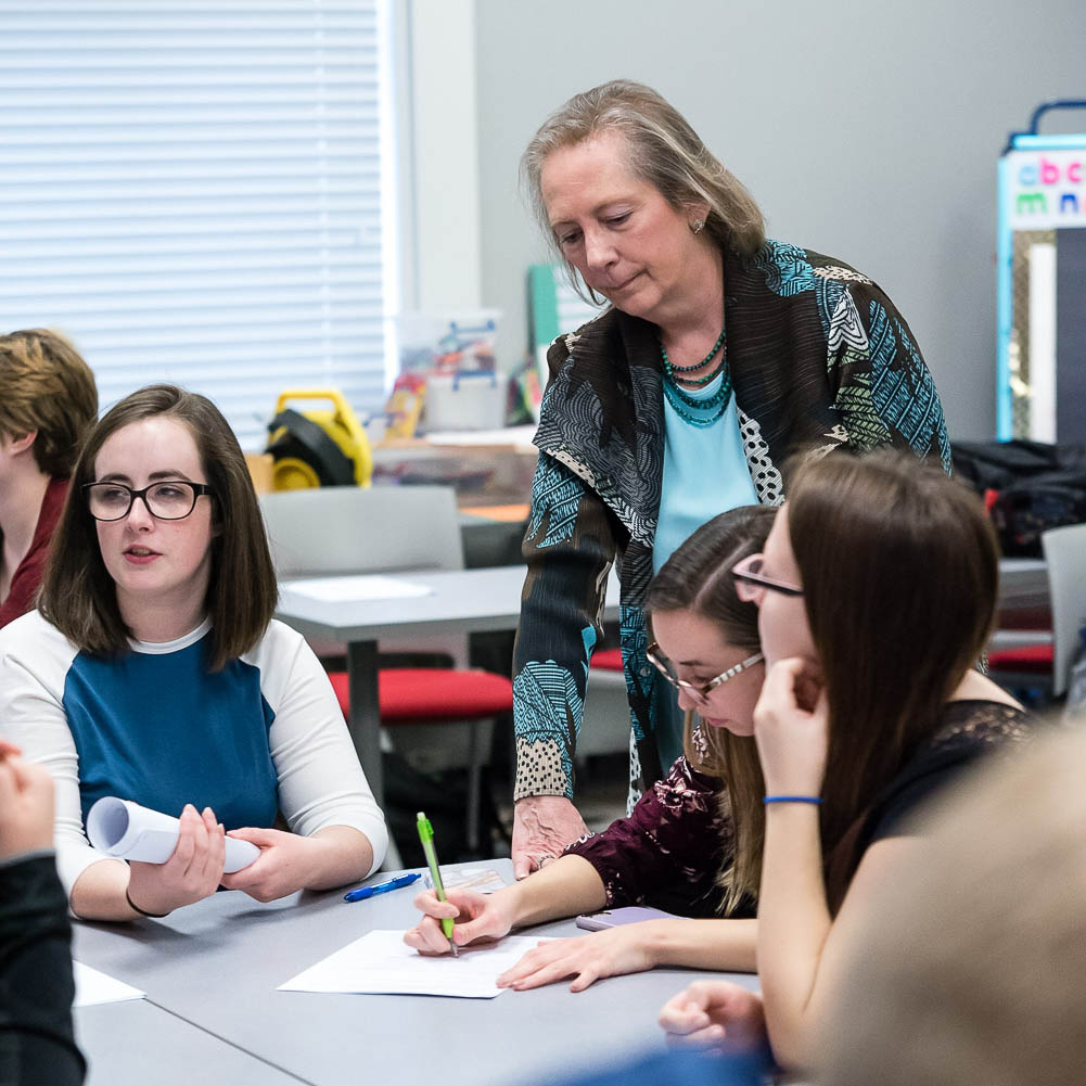 Dottie Herb of Marietta College listens to students in the classroom