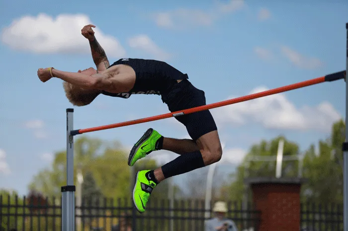 Athlete clearing the high jump bar