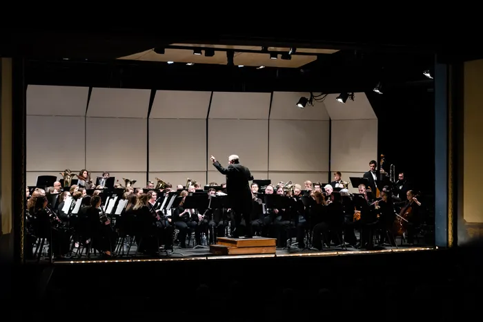 Marietta College band and wind ensemble performing at Peoples Bank Theatre
