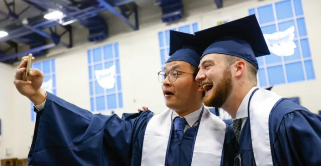 Graduates take a selfie