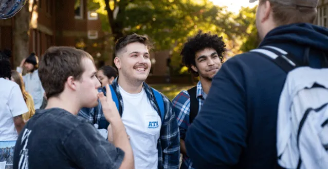 Male students smiling