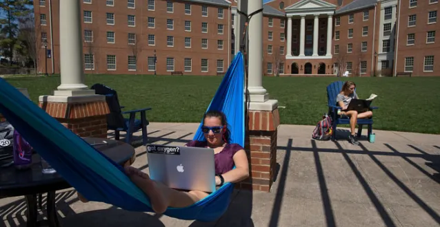 Students studying outside of Harrison Hall