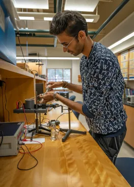 An Engineering Dual Degree major works in a lab in the Rickey Science Center at Marietta College