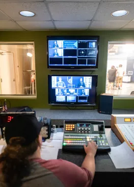A Marietta College student majoring in journalism and broadcasting produces a newscast for WCMO