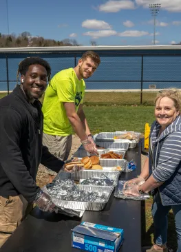 Sport Management Students prepare food during Marietta College Baseball Community Day