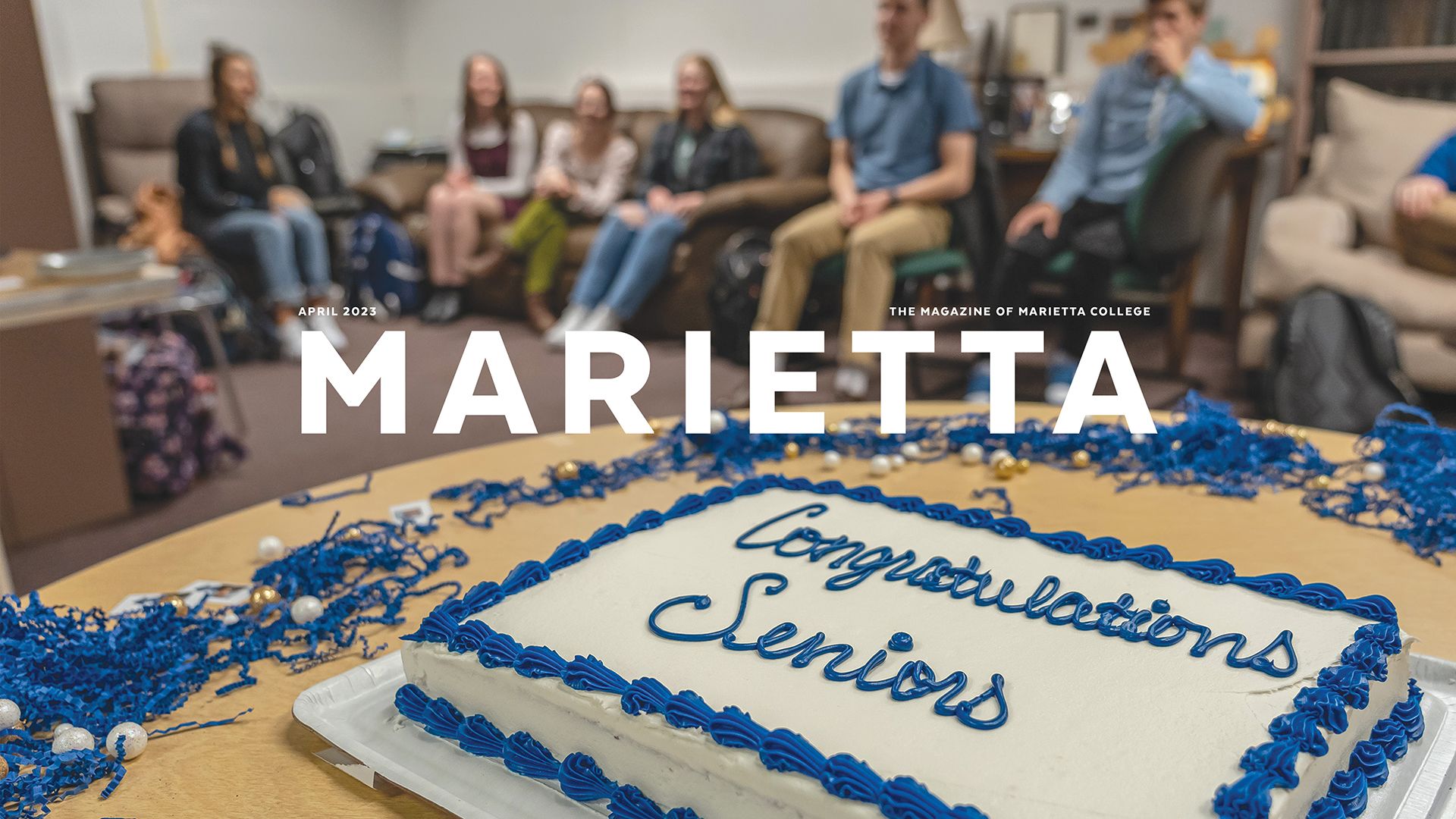 April 2023 Marietta Magazine Cover featuring photo of seniors celebrating with cake