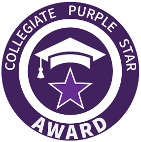 Circular purple and white badge with a graduation cap and a puple star in the middle and text on the outside. Text reads "Collegiate Purple Star Award"
