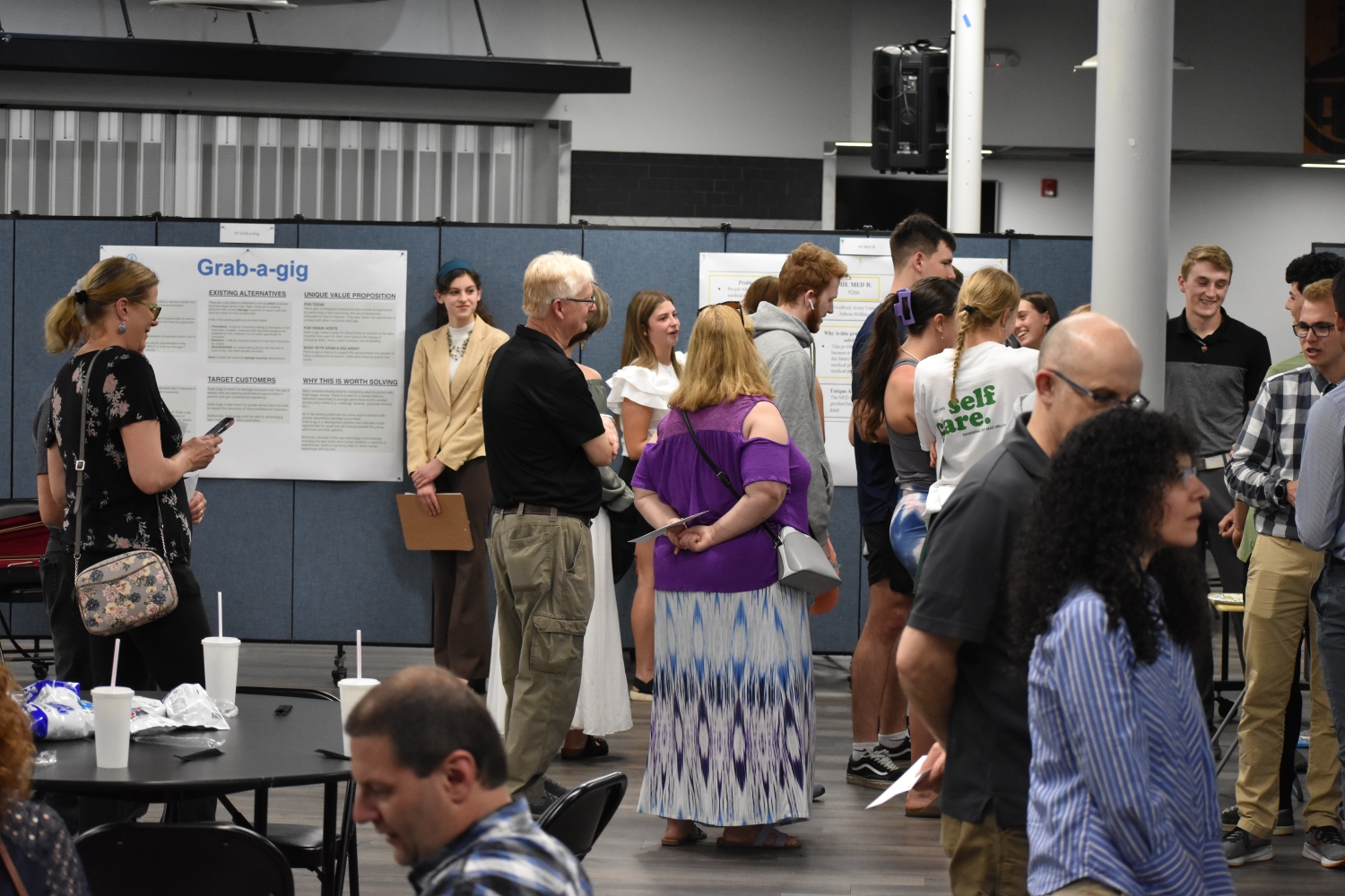 Junior PioBiz Competitors interact with the audience and judges