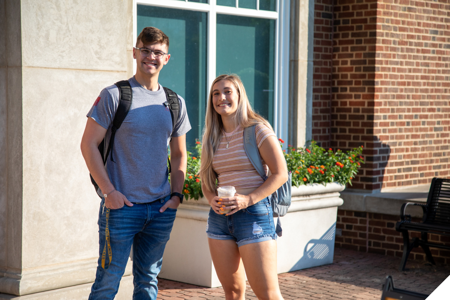 Two Marietta College students pose in front of the Legacy Library