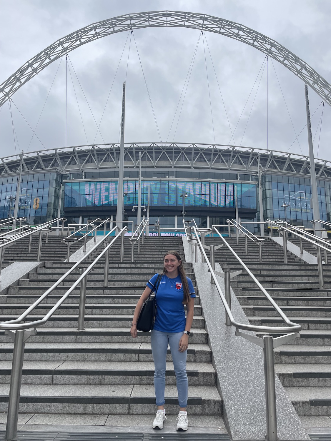 Marietta College student Kaylie Ward ’24 poses for a photo in front of Wembley Stadium during her Education Abroad trip