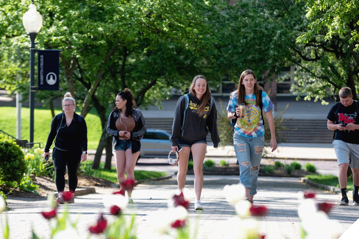 Marietta College students walking on the Christy Mall
