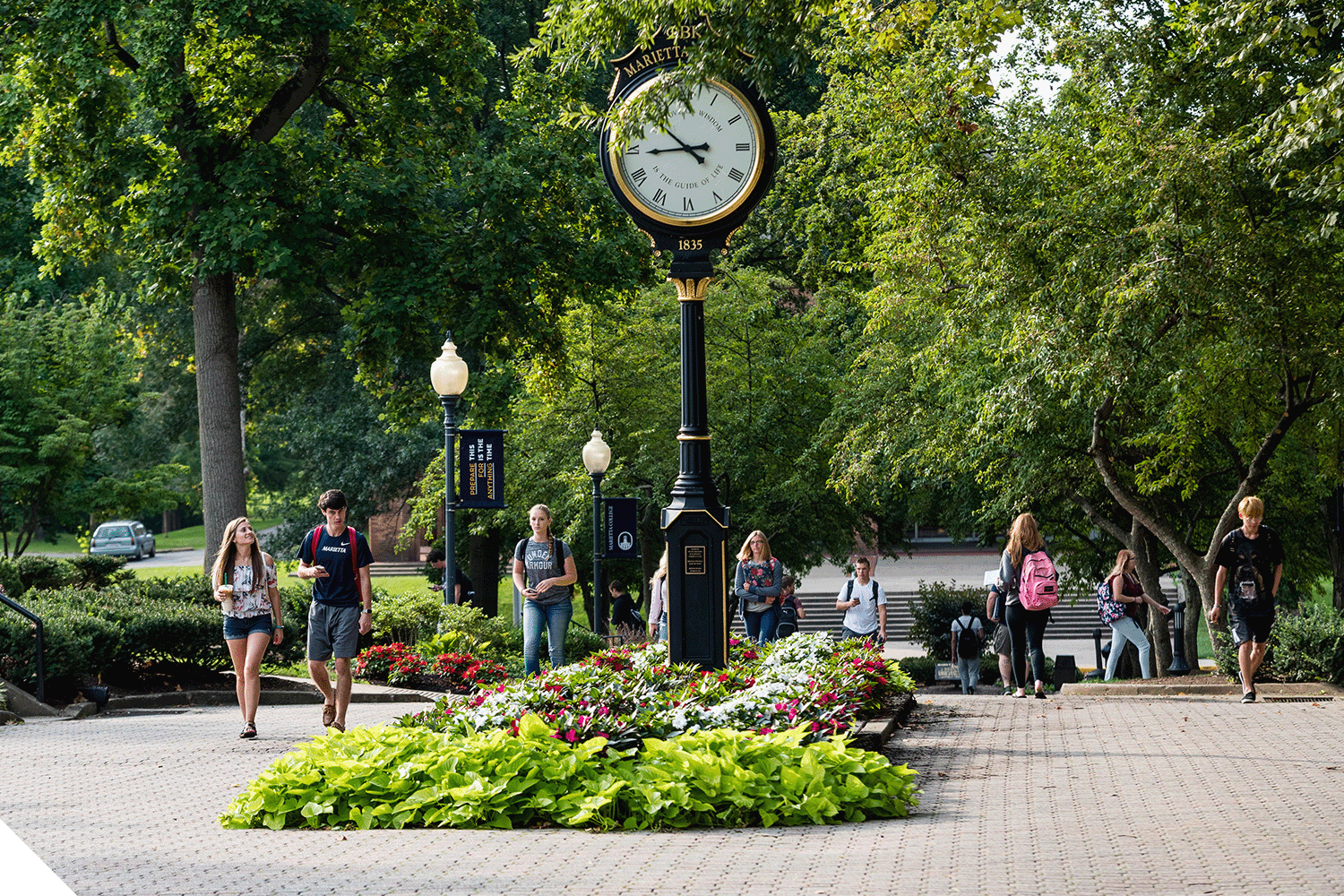 Marietta College students walking on the Christy Mall