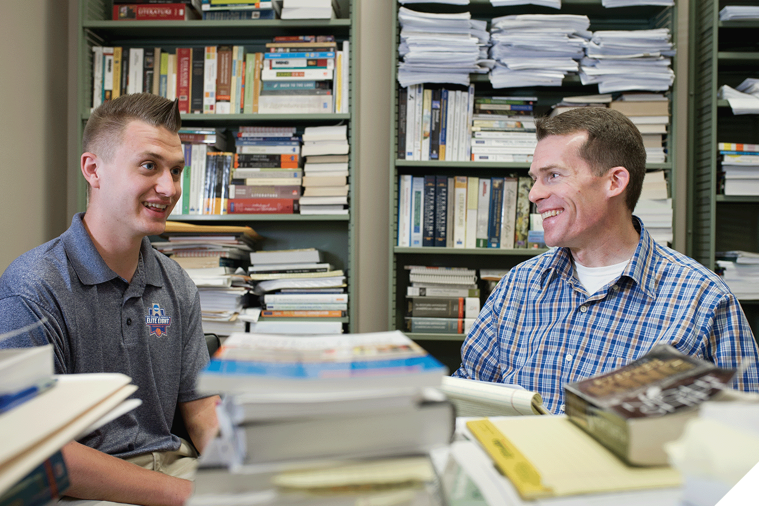 A Marietta College student speaks with a professor