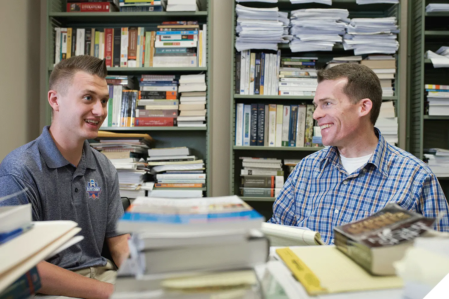 A Marietta College student speaks with a professor