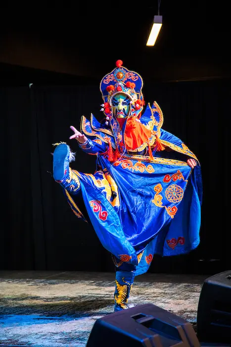 A person in a traditional Bian Lian costume at Marietta College's Lunar New Year celebration