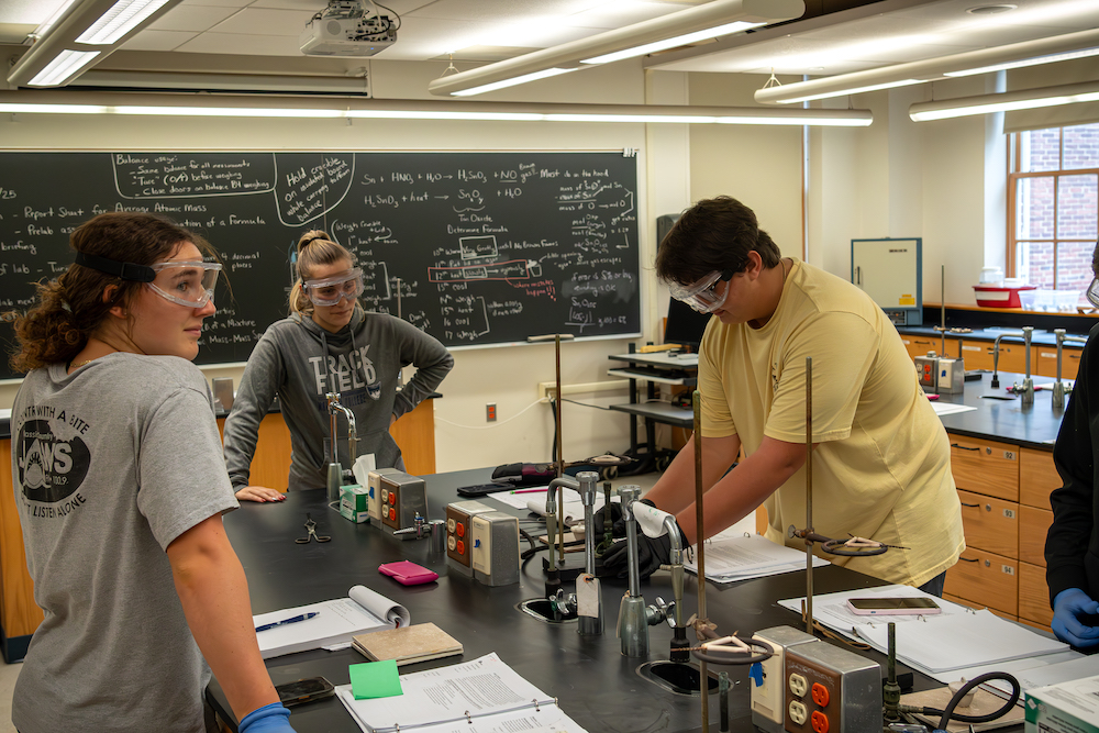 Marietta College students working in a chemistry lab.