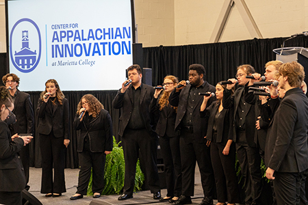 Floodstage performs at College event