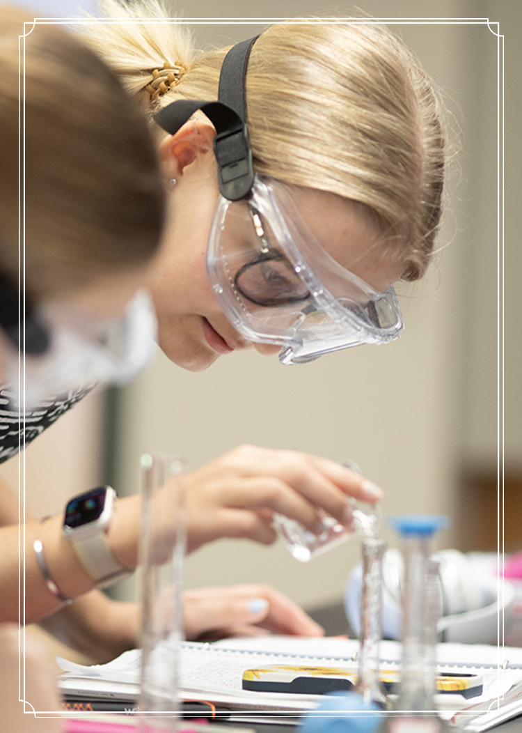 student in chemistry lab