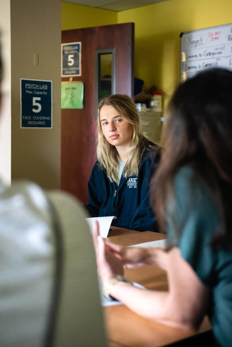 A psychology student sits in the Marietta College Psych Lab