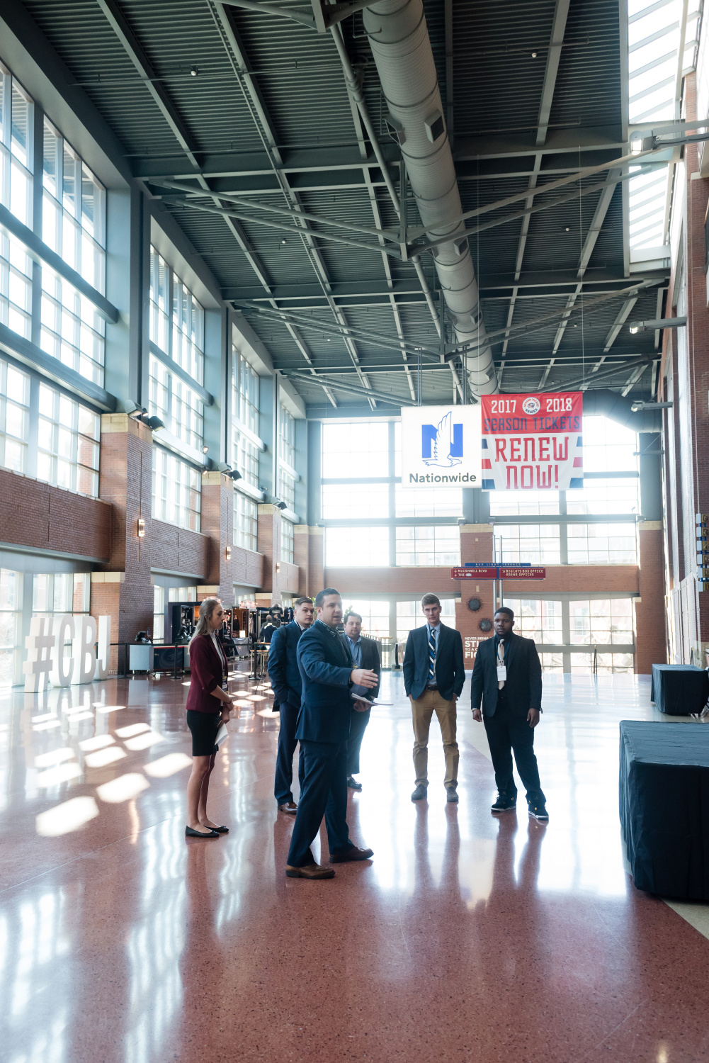 Marietta College students standing in the Columbus Blue Jackets stadium for a job shadowing opportunity