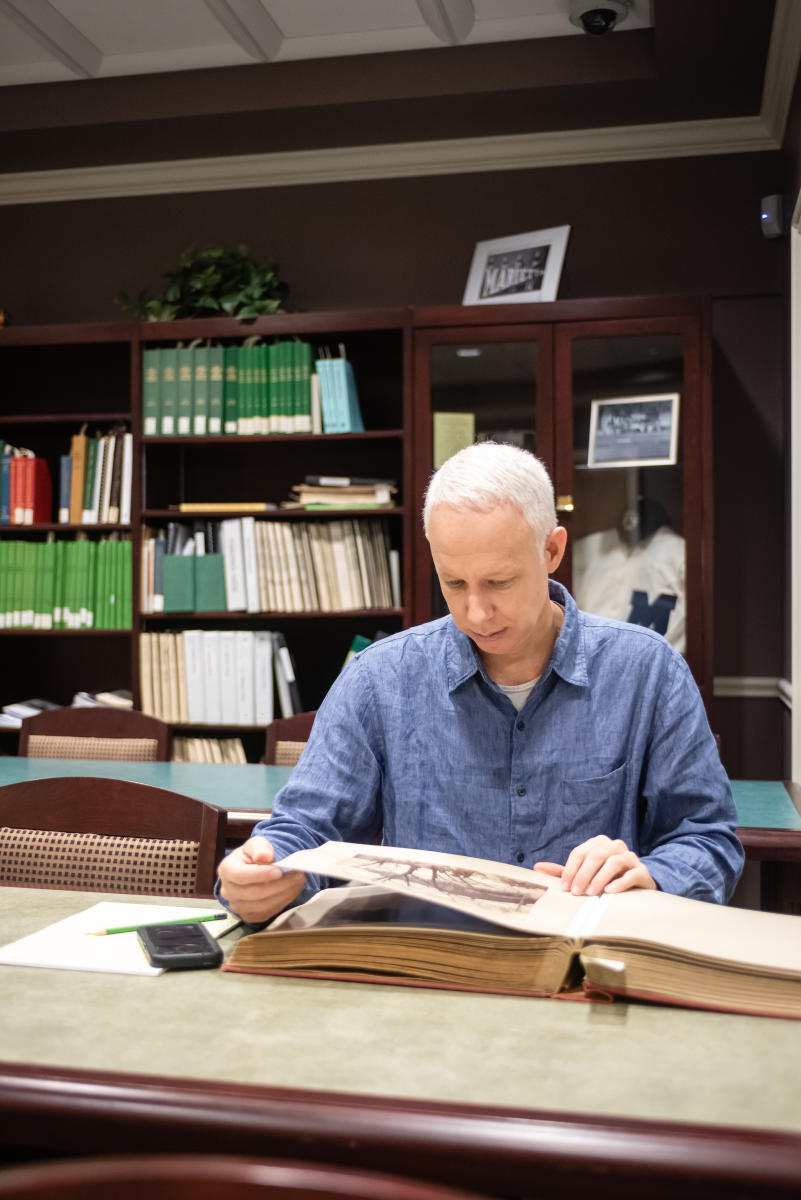 Marietta College professor working in the Special Collections