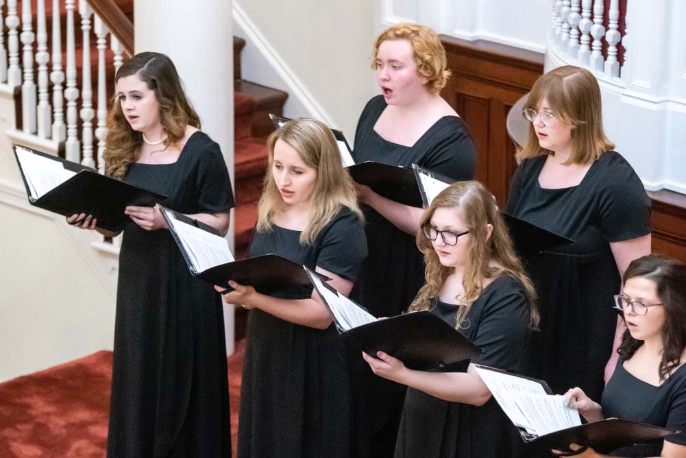 Members of the Marietta College Women's Choir perform a local concert