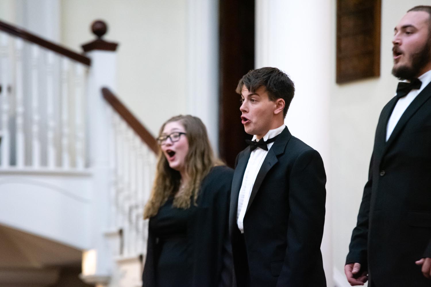 Marietta College Concert Choir members sing at a concert in a nearby chruch