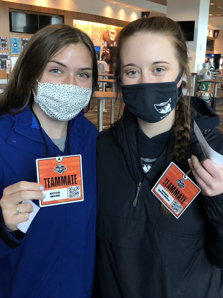 Kaylie Ward ’24 and Lexi Darlymple’21 volunteer at the 2021 NFL Draft