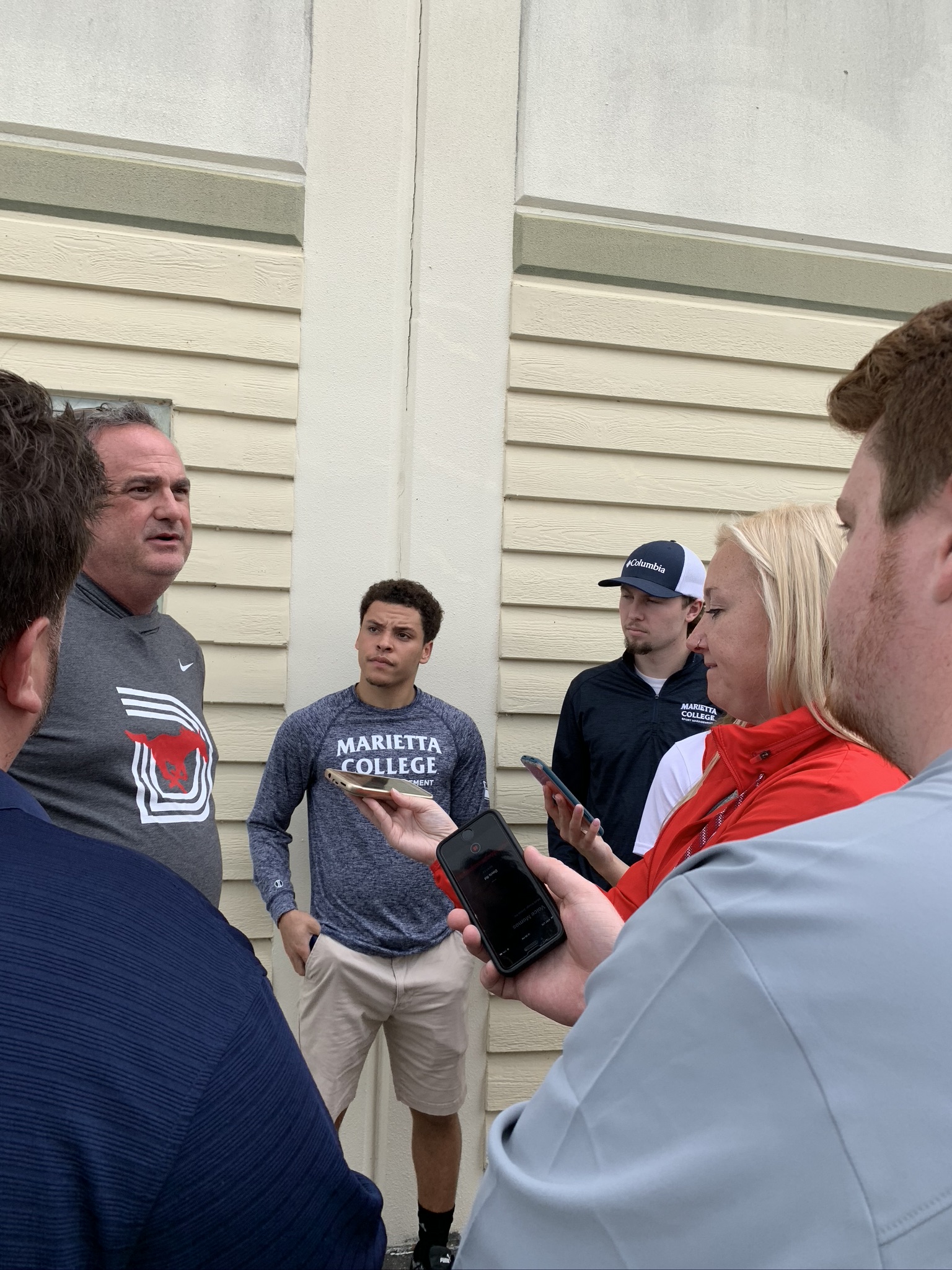 Marietta College students handling the post-practice press conference with then SMU Head Coach Sony Dykes at the Boca Raton Bowl