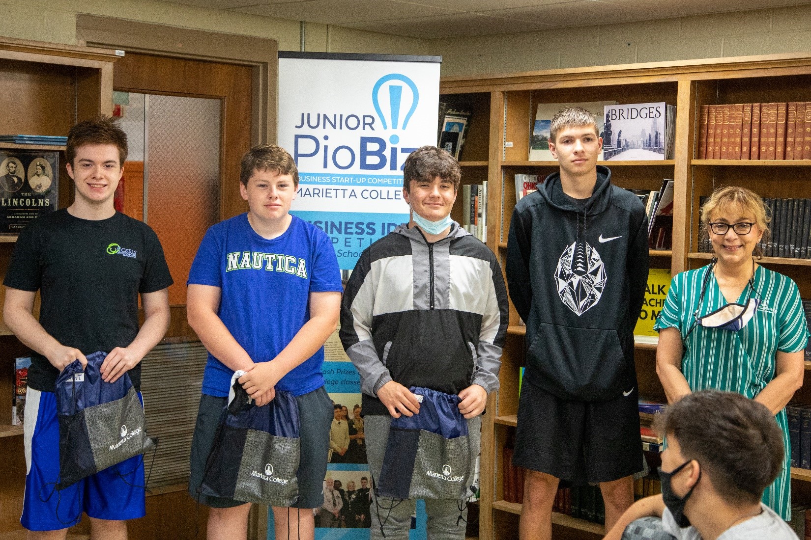 Dr. Khorassani visited Belpre High School to present the fourth-place award to Nicholas Lambert, Anthony Sampson, Matthew Rasmussen, and Evan Turrill for their project “Restaurant Rater”