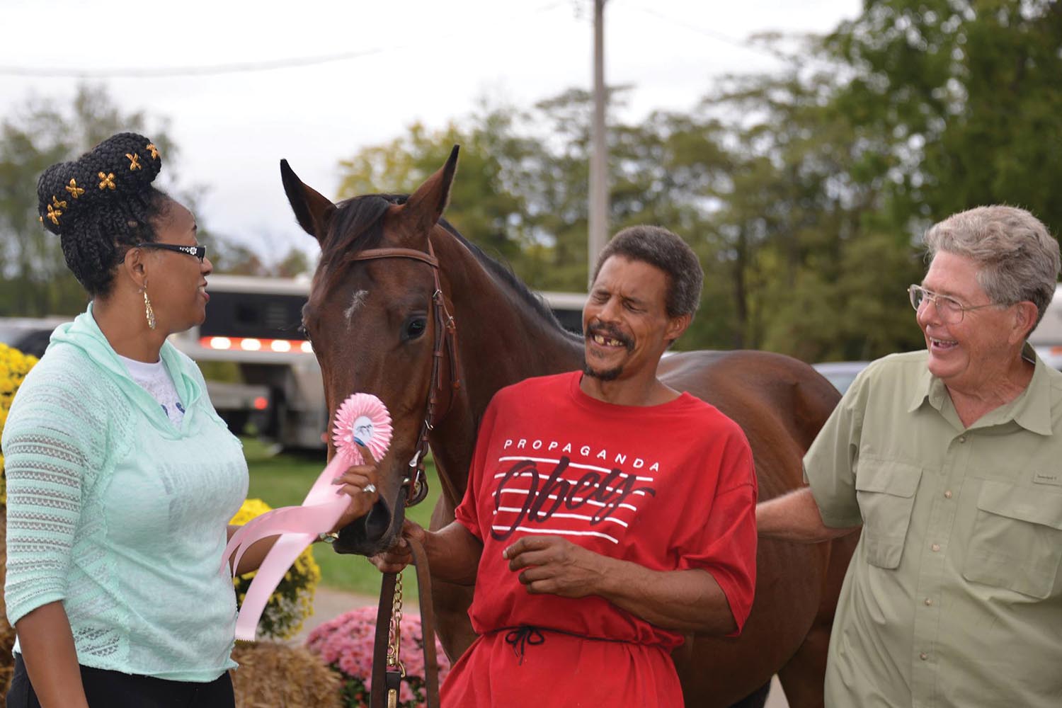 Dr. Richard Knapp ’63 (right) talks with Stevie Craig and Debbie McDonald during the West Virginia Thoroughbred Breeders Association’s annual show