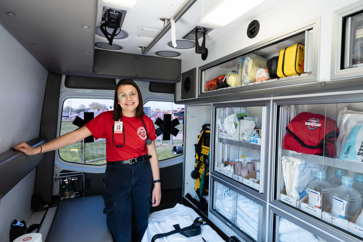 Marietta College student EMT in back of ambulance
