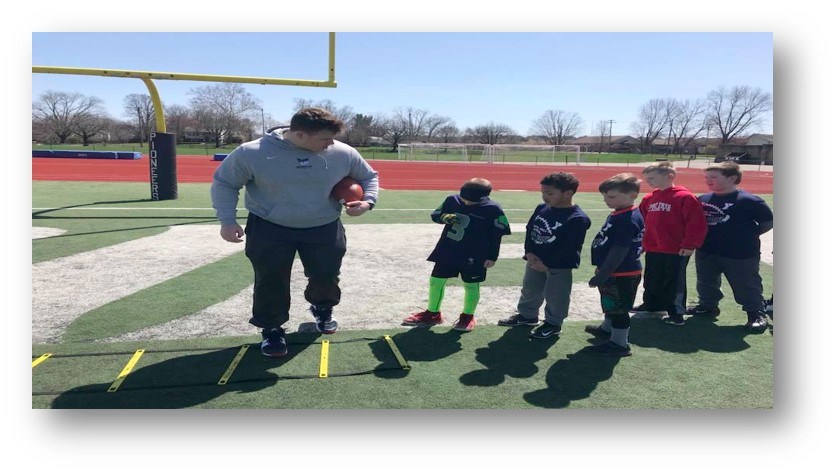 Dalton Seacrest '18 interned with the Marietta Family YMCA. One of his projects was creating a youth football clinic.