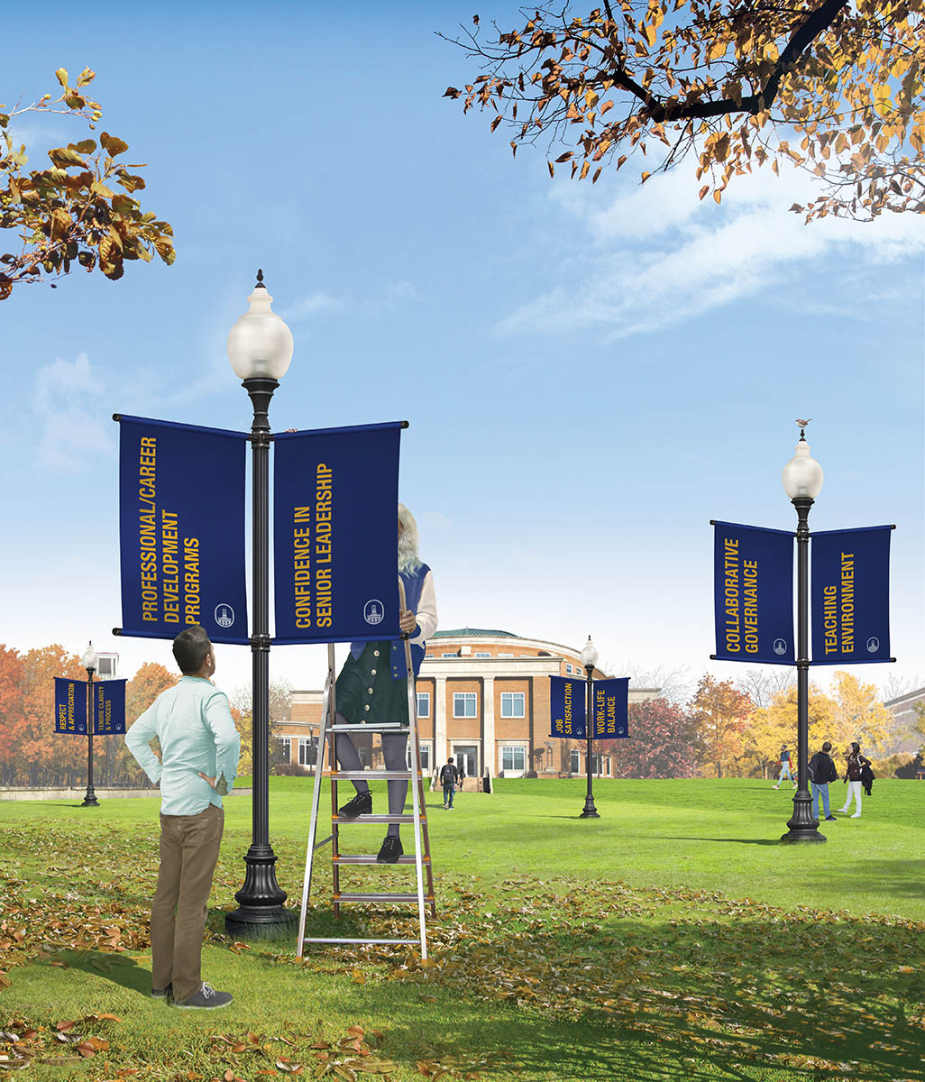 Marietta College Legacy Library with flags being put up in the foreground