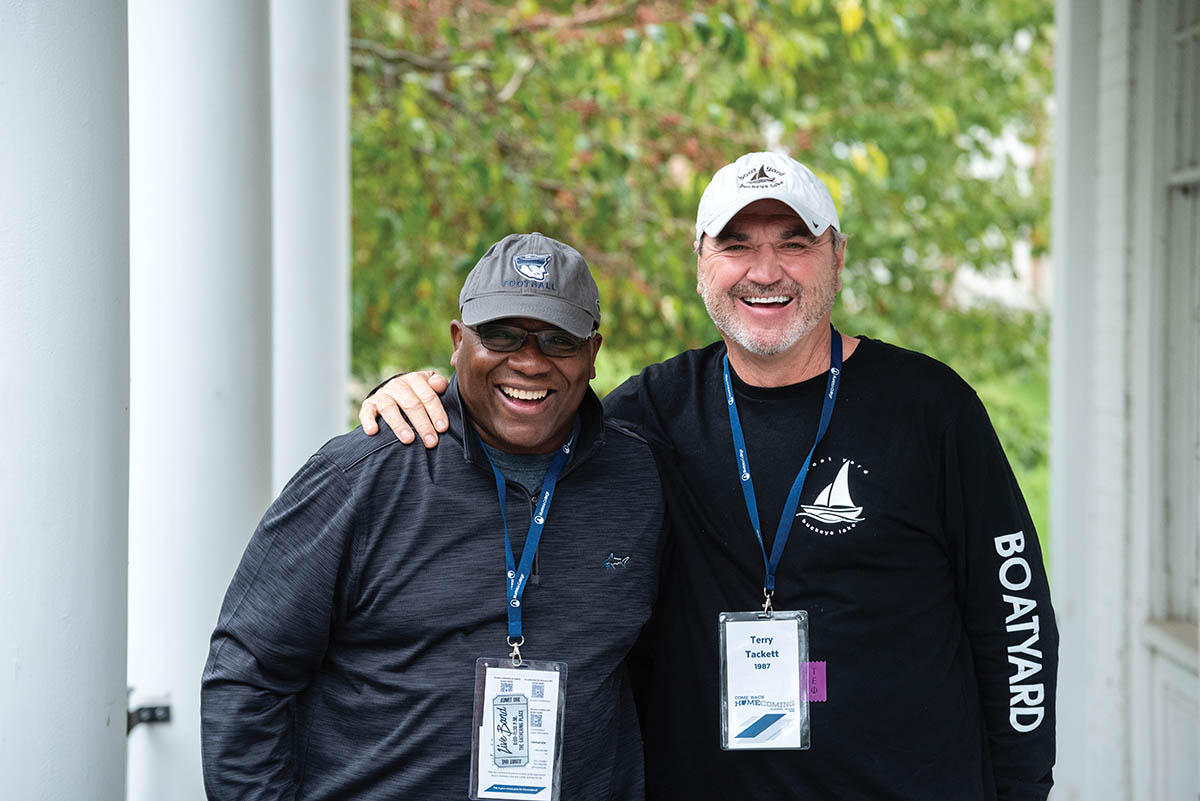 Charles Little â87 (left) and Terry Tackett â87 laughing at the camera