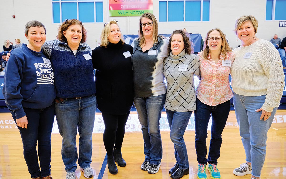 The Marietta College 1989 Women's Soccer Team stands center court for a group photo