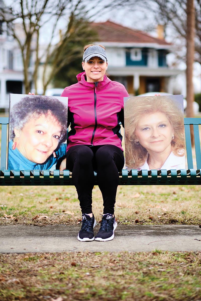 Staci Spung '11 sits with photos of her two grandmothers