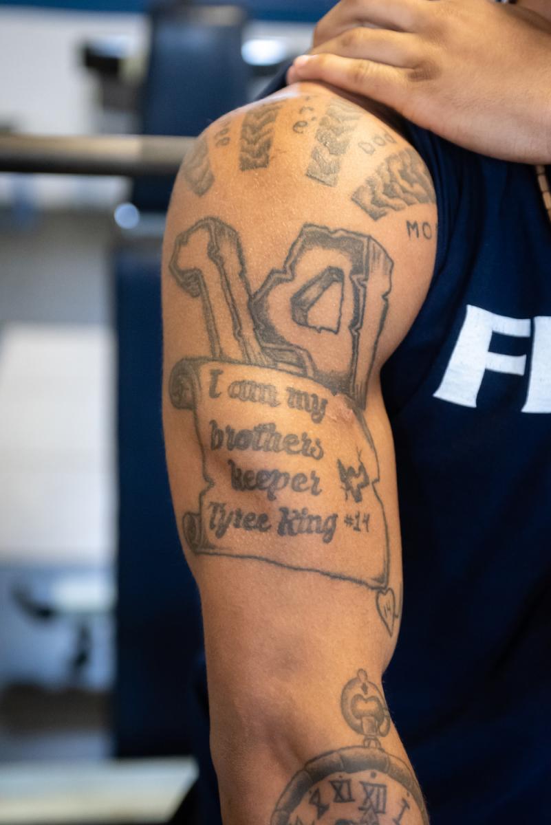 TJ King '22 arm tattoo