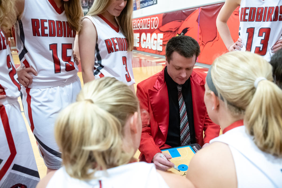 Tyler Bates '13 coaching the girls basketball team