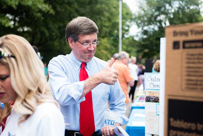 Bill Ruud on the Mall with students