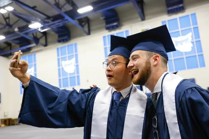 Graduates take a selfie