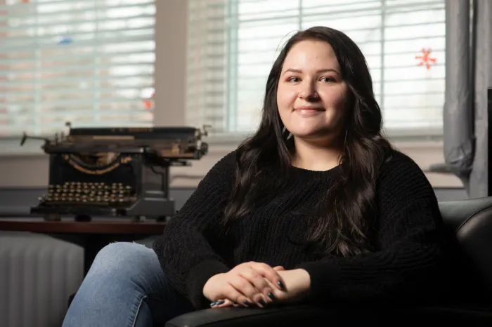 Samantha Rubadue sitting