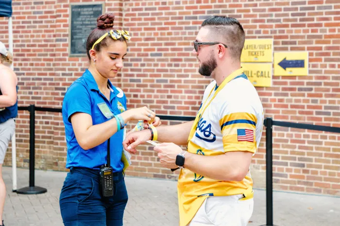 Intern helping a customer