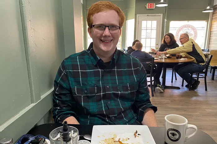 Austin McCleary eating breakfast