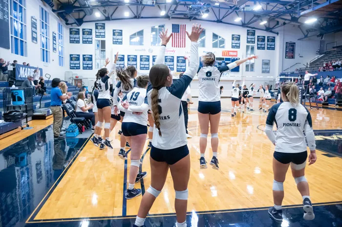 Volleyball players celebrating