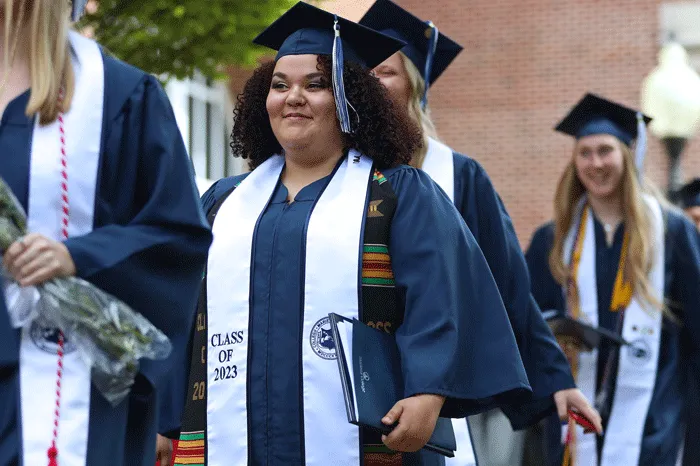 Female student smiling at graduation