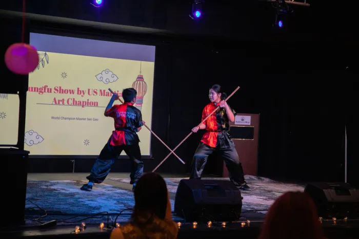 Two Martial Artists performing on stage at Marietta College's Gathering Place